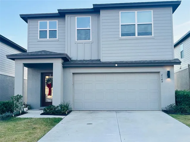 a front view of house with yard