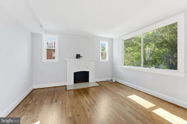 a view of entryway with wooden floor