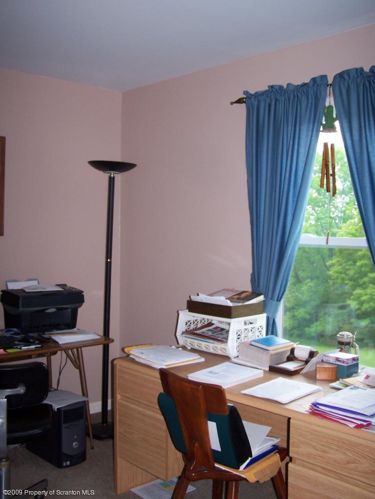 455 Maple Grove Road Factoryville, PA 18419 - Photo 6 of 16 a workspace with furniture and a window