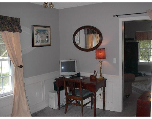 40 Bunyan Road Monson, MA 01057 - Photo 12 of 15 a view of a workspace with furniture and a window