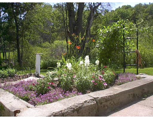 40 Bunyan Road Monson, MA 01057 - Photo 14 of 15 a view of a garden with potted plants
