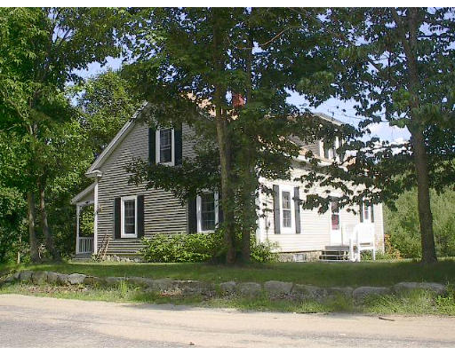 40 Bunyan Road Monson, MA 01057 - Photo 3 of 15 a front view of a house with a garden