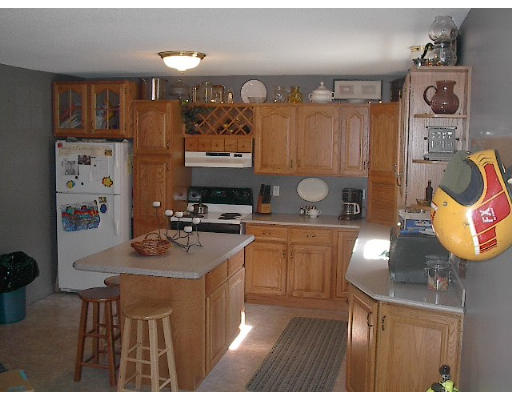 40 Bunyan Road Monson, MA 01057 - Photo 4 of 15 a kitchen with stainless steel appliances granite countertop a sink stove and cabinets