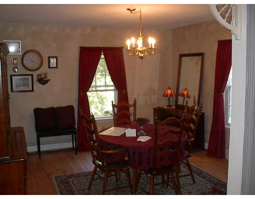 40 Bunyan Road Monson, MA 01057 - Photo 7 of 15 a view of a dining room with furniture and chandelier