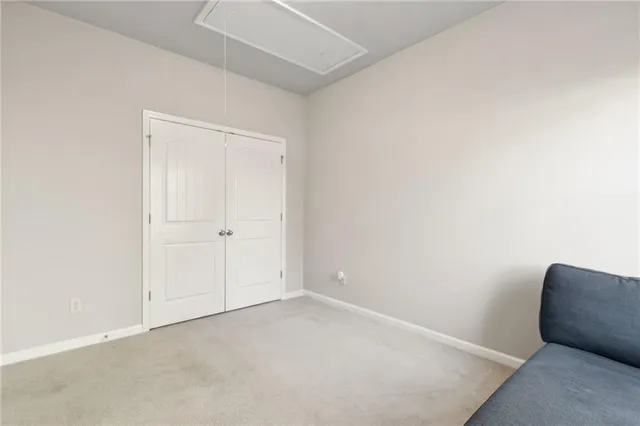 a view of a room with a window