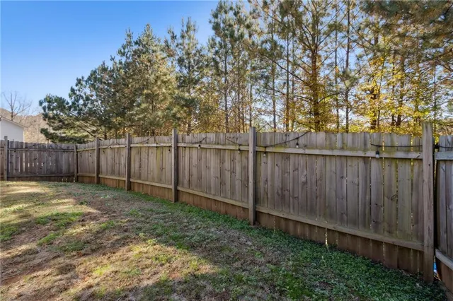 a view of pool with outdoor seating