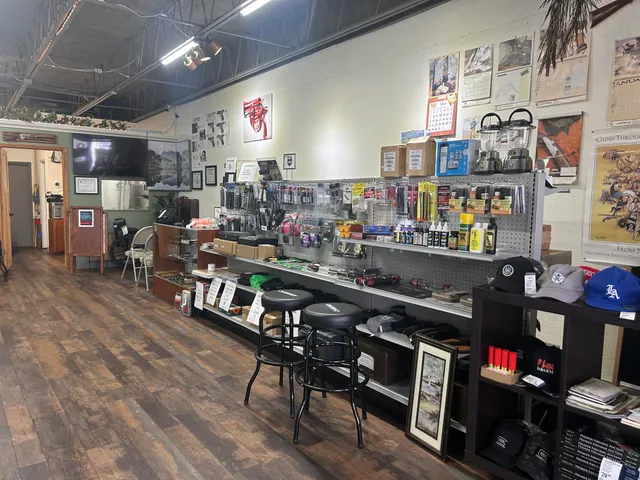 a view of a workspace with furniture and wooden floor