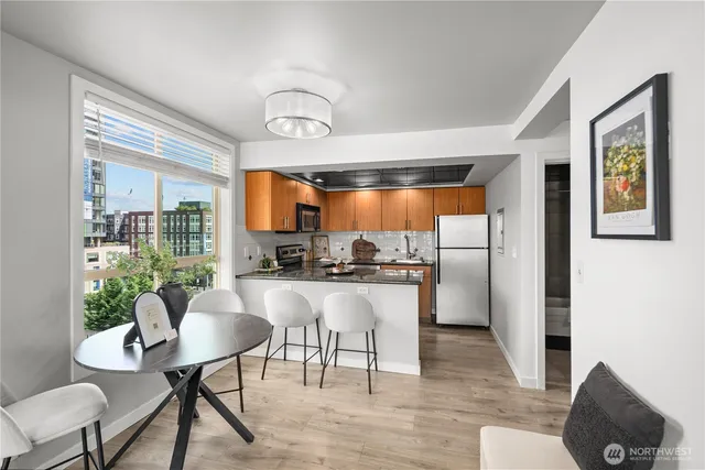 a room with furniture and a wooden floor