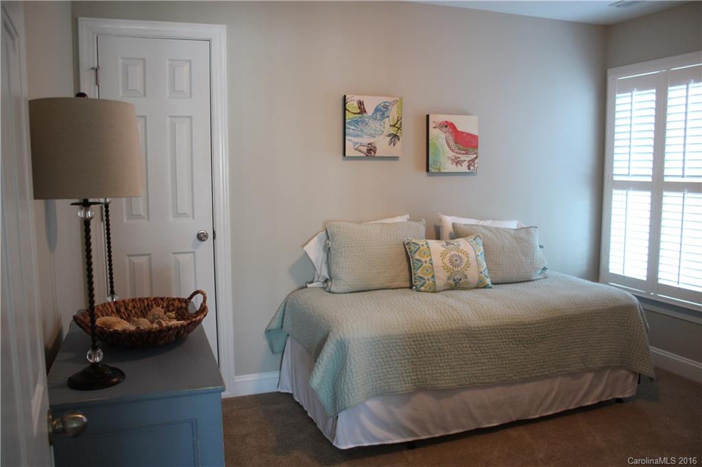 724 Revival Row Fort Mill, SC 29708 - Photo 13 of 15 a bedroom with a bed and a window