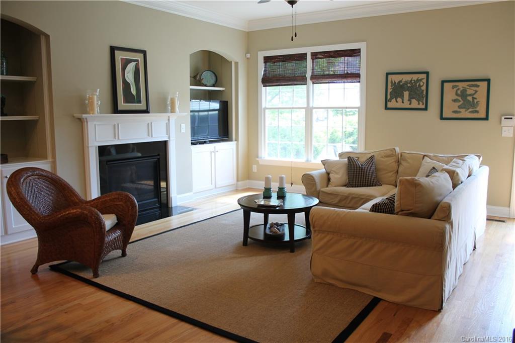 724 Revival Row Fort Mill, SC 29708 - Photo 5 of 15 a living room with furniture and a fireplace