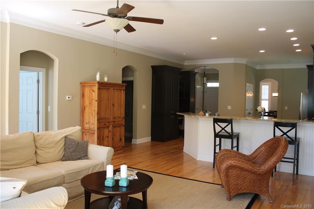 724 Revival Row Fort Mill, SC 29708 - Photo 6 of 15 a living room with furniture and a chandelier