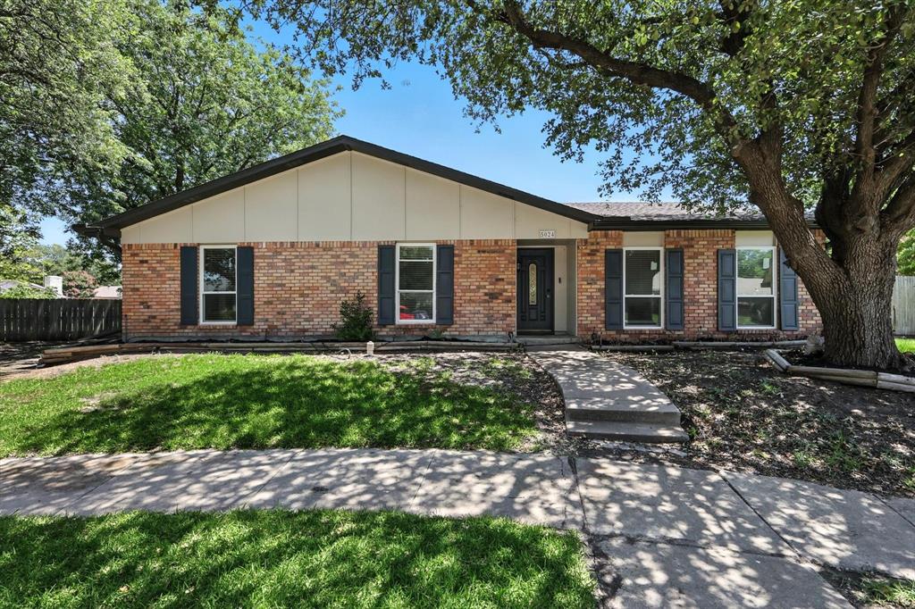 5024 Middleton Circle The Colony, TX 75056 - Photo 2 of 30 a view of a house with a yard