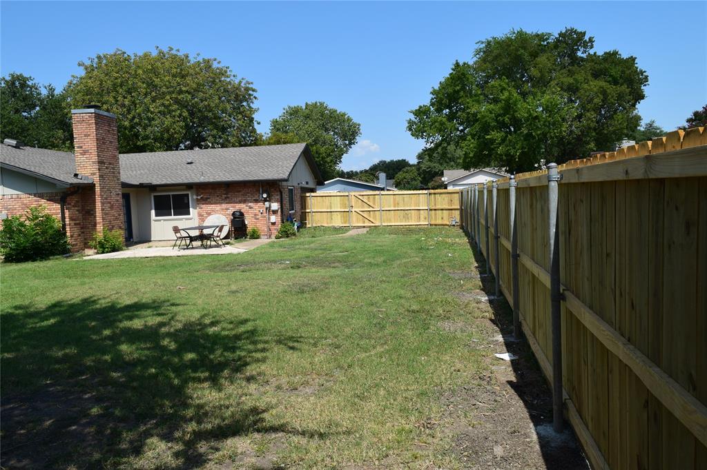 5024 Middleton Circle The Colony, TX 75056 - Photo 28 of 30 a view of a backyard with a garden