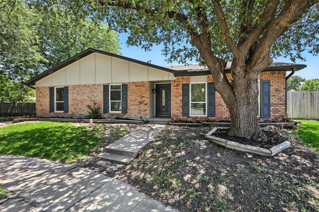 5024 Middleton Circle The Colony, TX 75056 - Photo 3 of 30 a view of a house with a yard