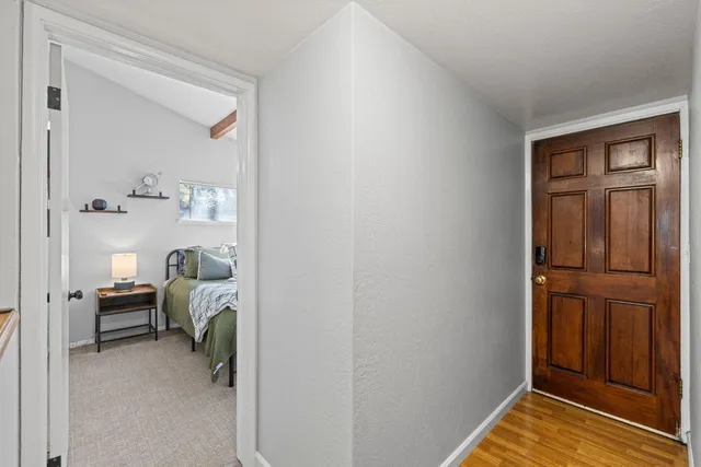 a bathroom with a sink a toilet and vanity