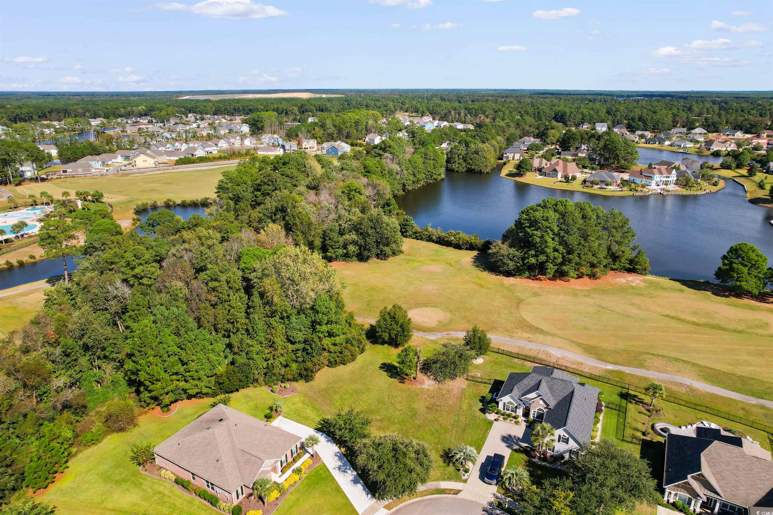 1005 Whooping Crane Drive Conway, SC 29526 - Photo 10 of 35 Aerial view of residential area with a nearby body of water and a golf club