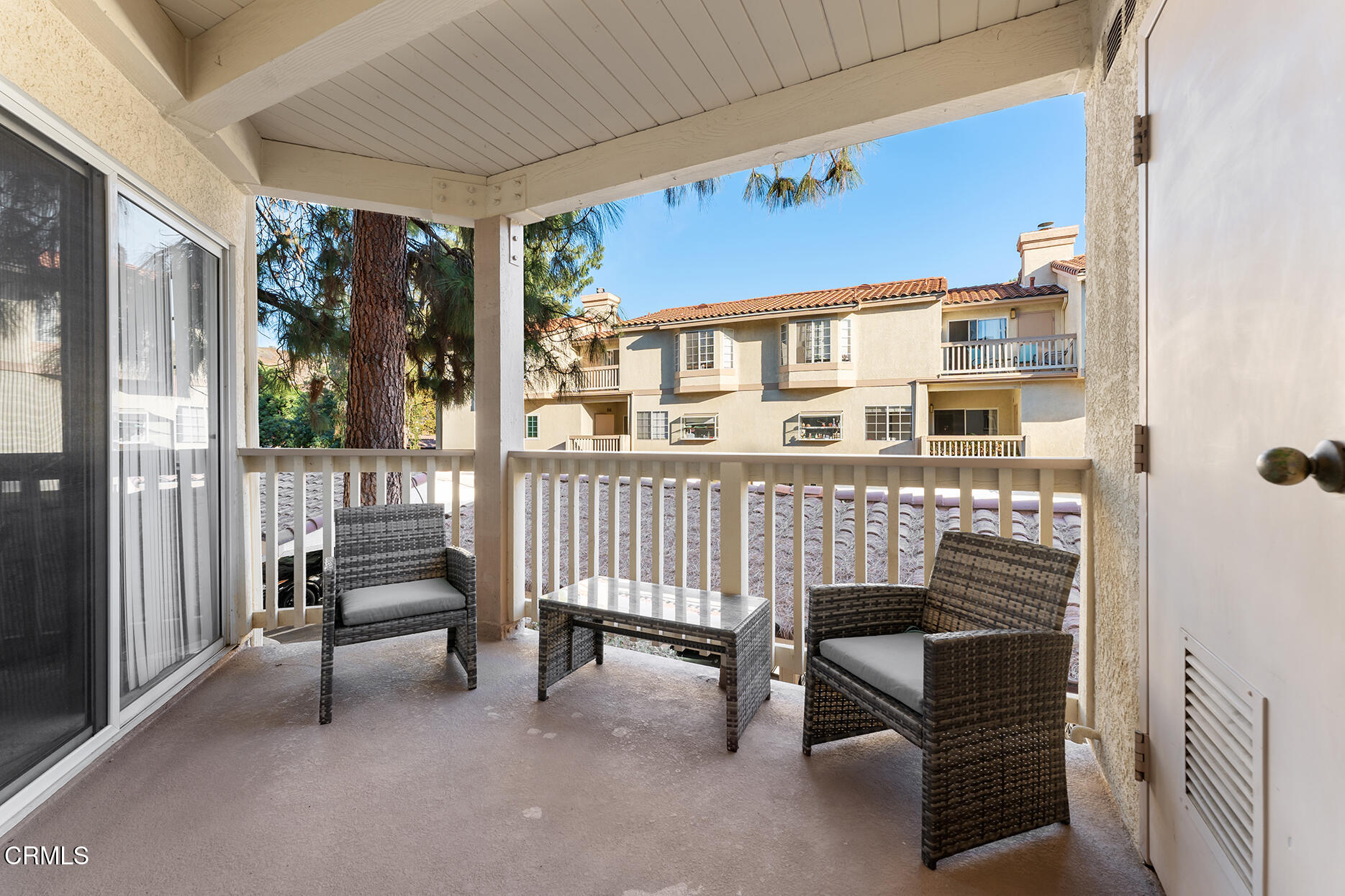 a balcony view with a outdoor space