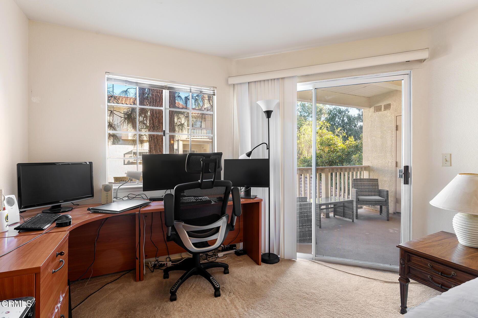 697 Sutton Crest Trail, Unit 304 Oak Park, CA 91377 - Photo 11 of 21 a view of a workspace with furniture and a window