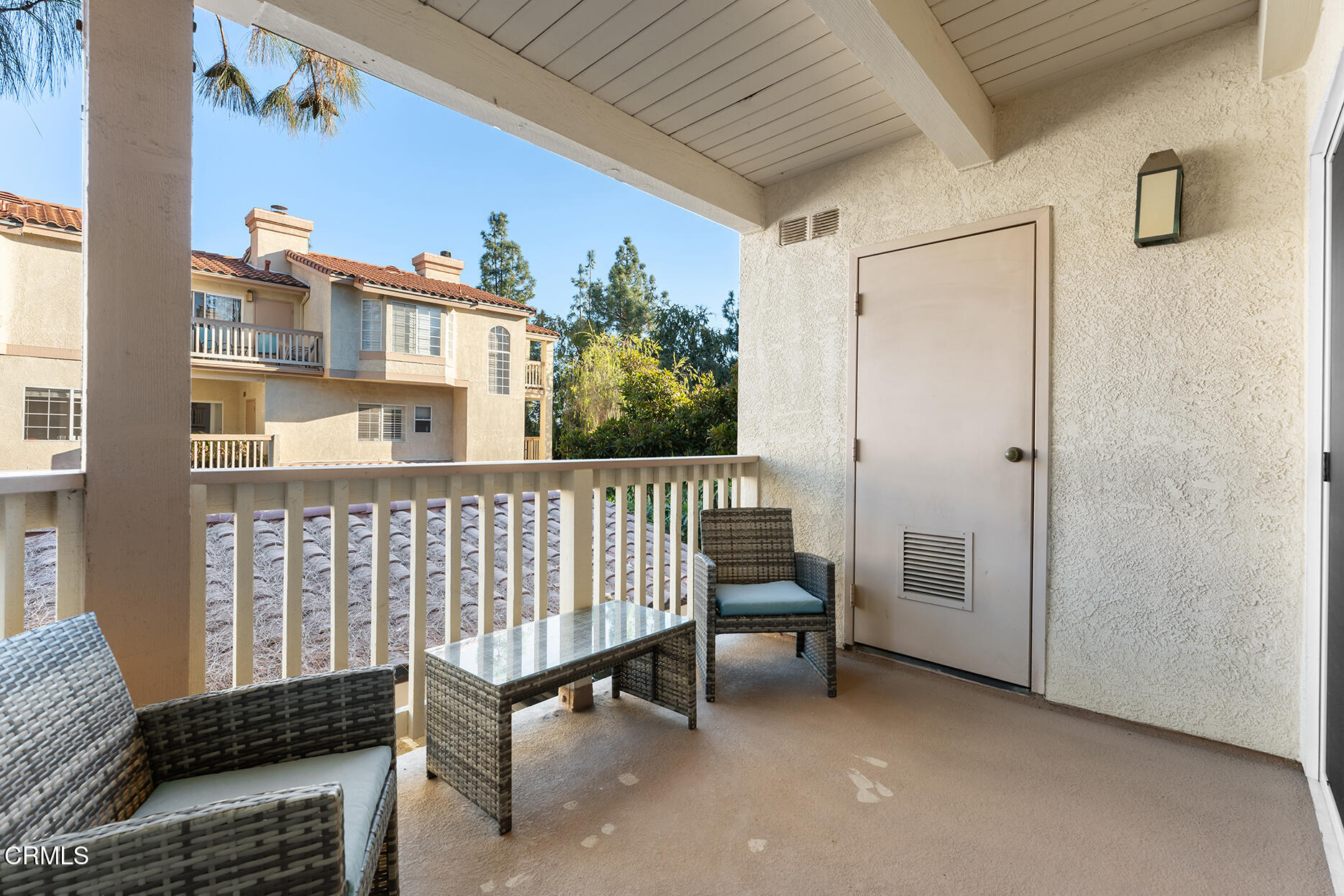 697 Sutton Crest Trail, Unit 304 Oak Park, CA 91377 - Photo 14 of 21 a view of a balcony with furniture
