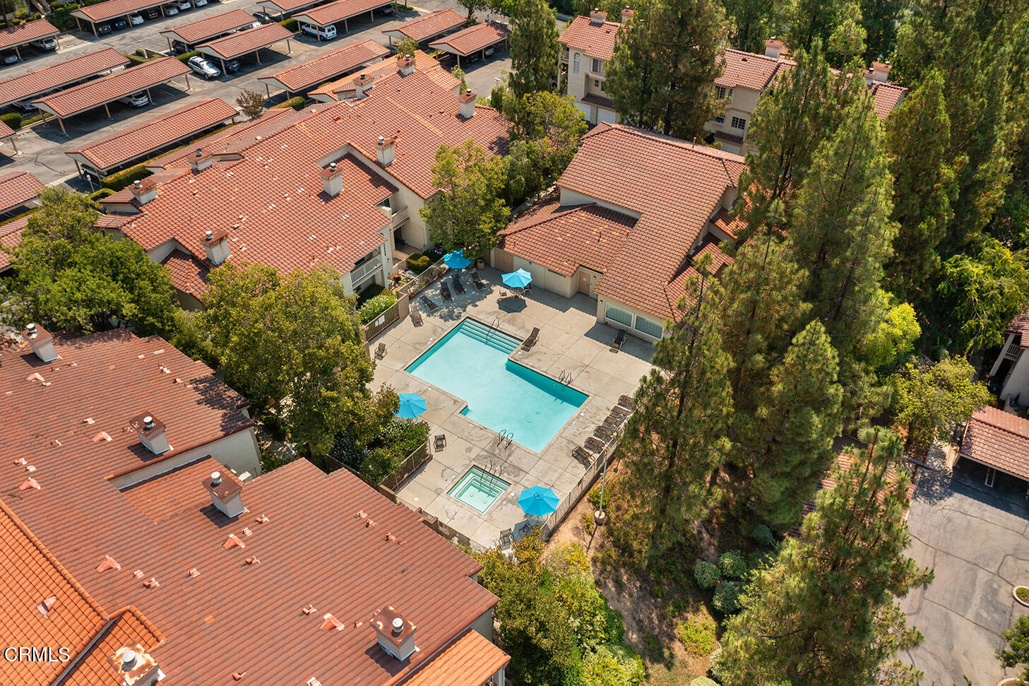 697 Sutton Crest Trail, Unit 304 Oak Park, CA 91377 - Photo 20 of 21 an aerial view of residential houses with outdoor space and street view
