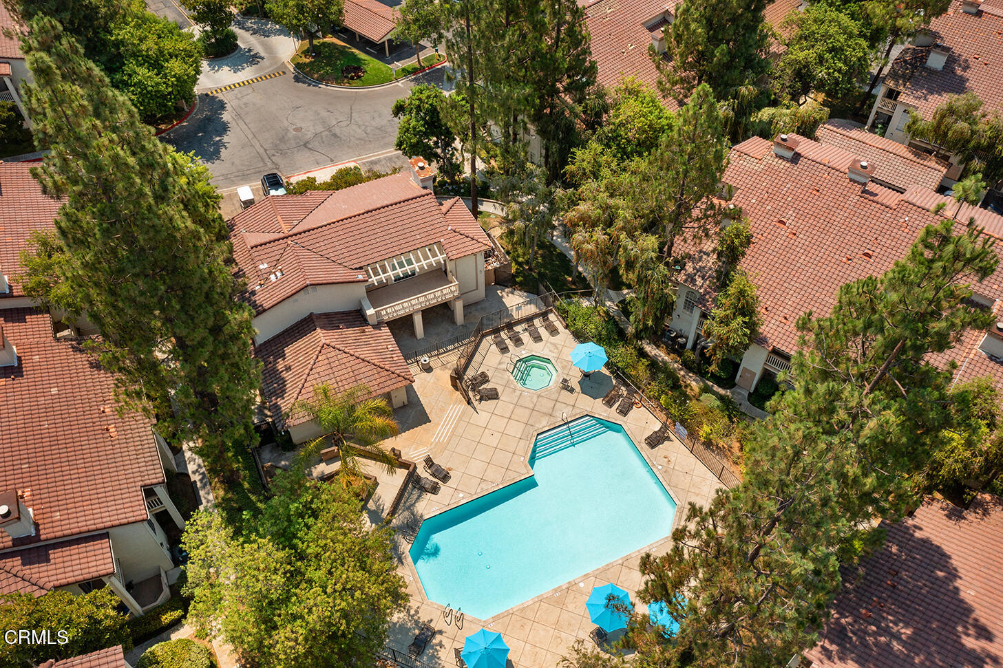 697 Sutton Crest Trail, Unit 304 Oak Park, CA 91377 - Photo 21 of 21 an aerial view of a house with outdoor space and swimming pool