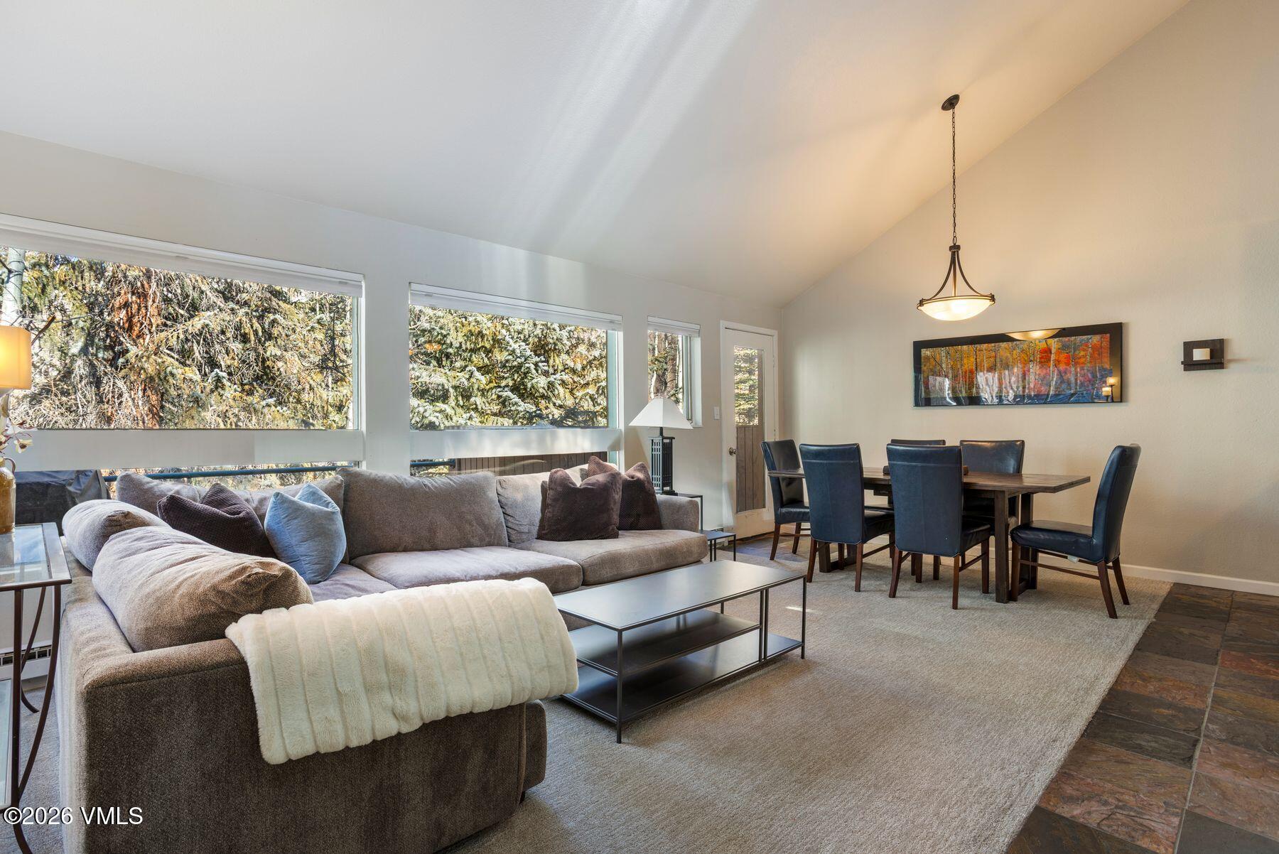 3911 Big Horn Road, Unit 1D Vail, CO 81657 - Photo 11 of 31 a living room with furniture and a window