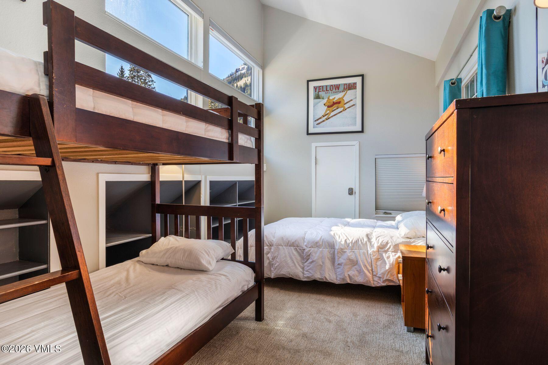 3911 Big Horn Road, Unit 1D Vail, CO 81657 - Photo 6 of 31 a bedroom with two beds and a window