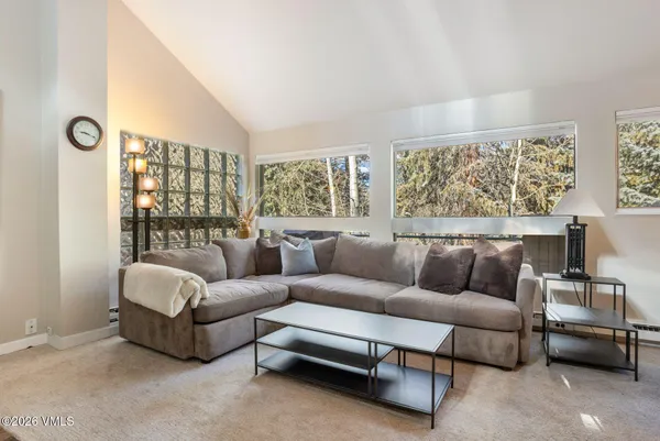 a front view of a house with parking