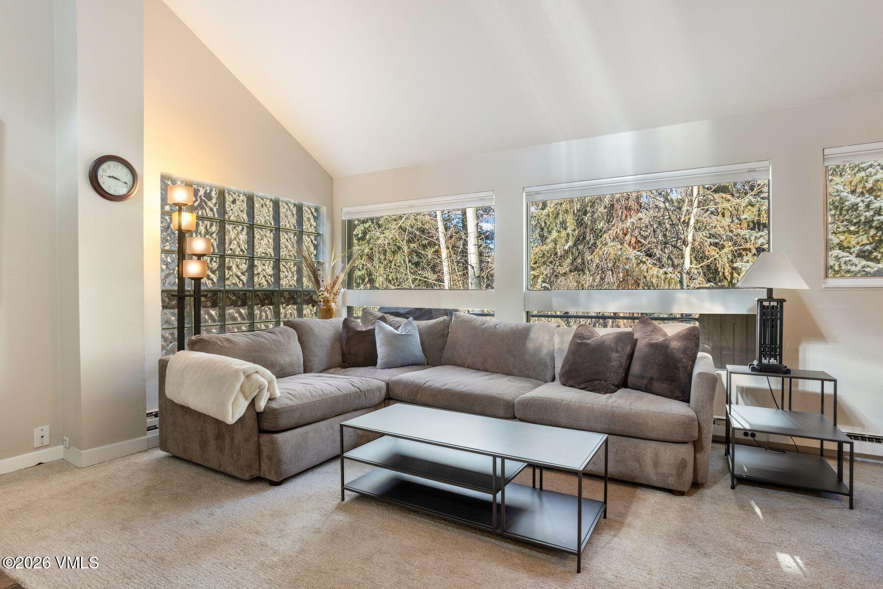 3911 Big Horn Road, Unit 1D Vail, CO 81657 - Photo 9 of 31 a living room with furniture and a large window