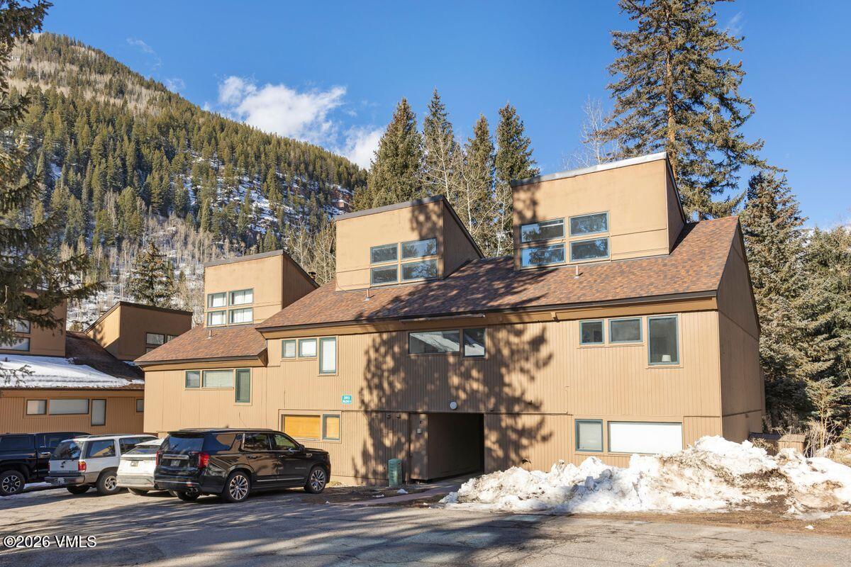 3911 Big Horn Road, Unit 1D Vail, CO 81657 - Photo 10 of 31 a front view of a house with parking