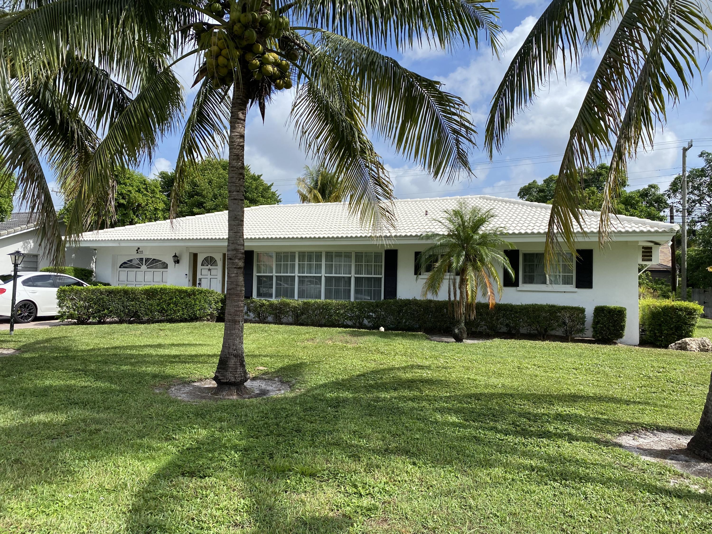 1955 North Conference Drive Boca Raton, FL 33486 - Photo 1 of 6 FRONT EXTERIOR
