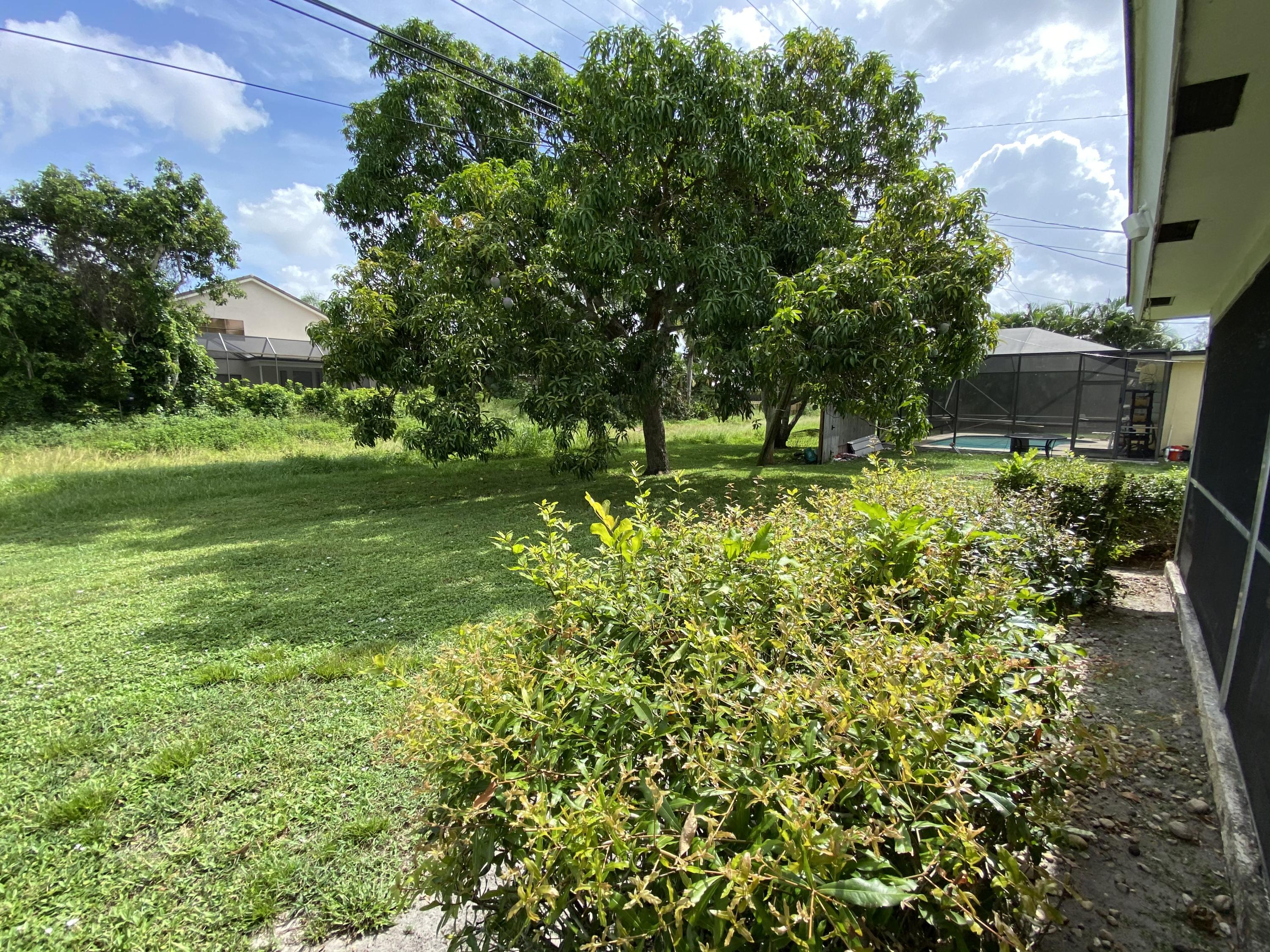 1955 North Conference Drive Boca Raton, FL 33486 - Photo 2 of 6 MORE YARD