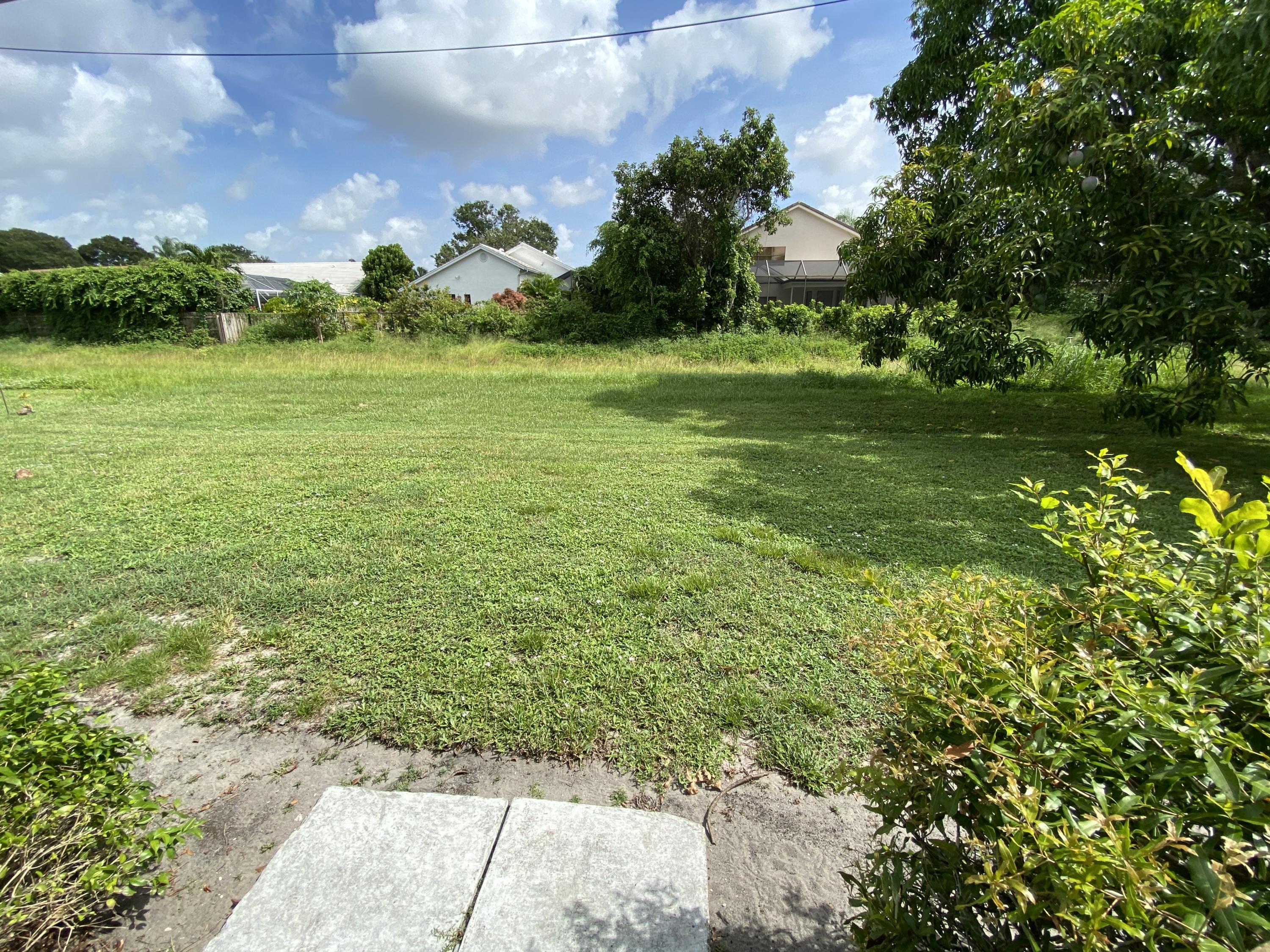 1955 North Conference Drive Boca Raton, FL 33486 - Photo 3 of 6 REAR YARD