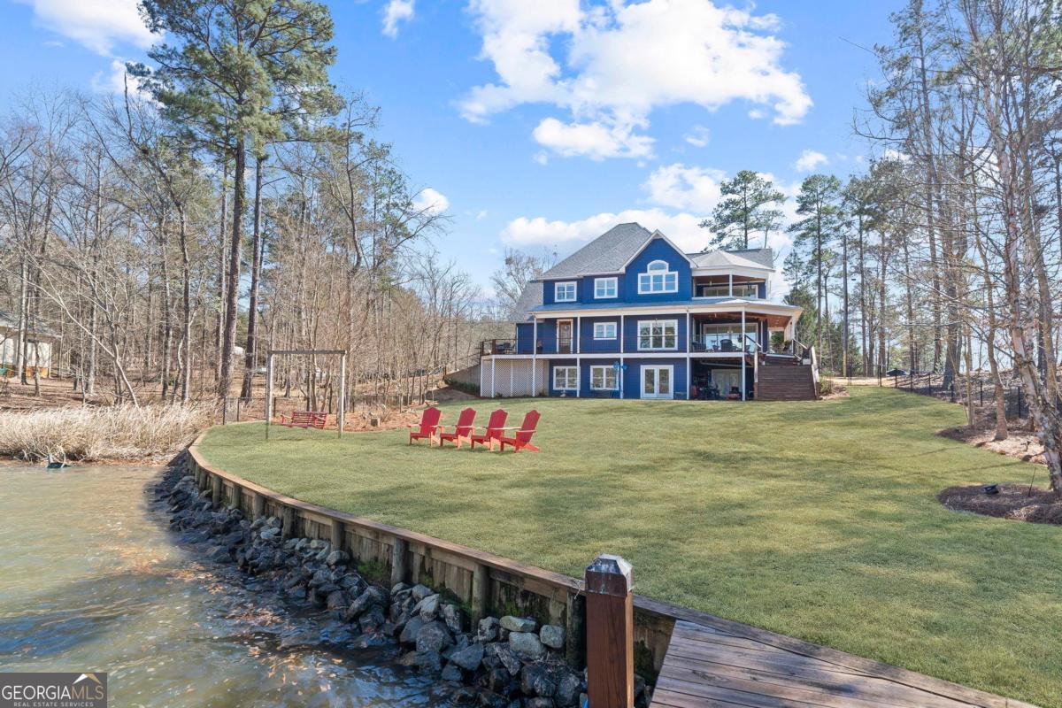 392 Big Oconee River Road Sparta, GA 31087 - Photo 63 of 69 a view of a house with a big yard