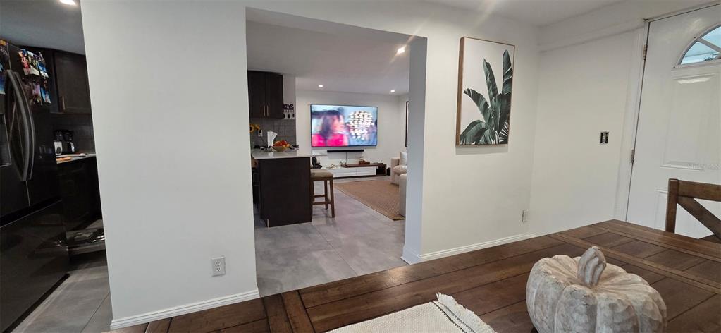 146 Marsella Road DeBary, FL 32713 - Photo 3 of 9 a room with furniture and wooden floor