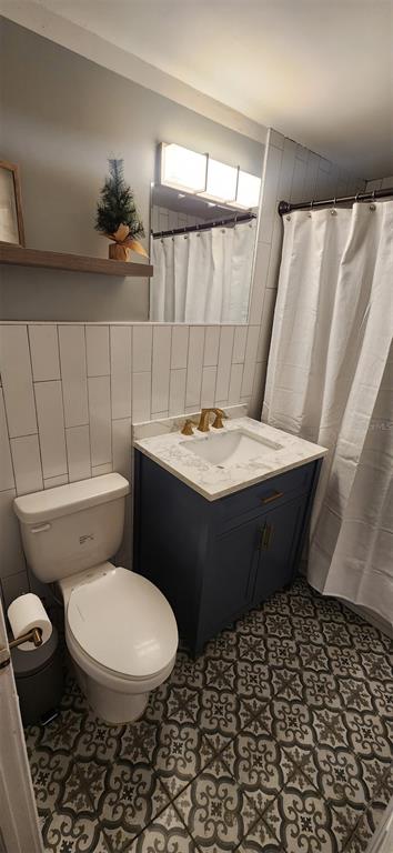 146 Marsella Road DeBary, FL 32713 - Photo 6 of 9 a bathroom with a sink toilet and shower