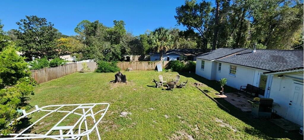 146 Marsella Road DeBary, FL 32713 - Photo 9 of 9 a view of a house with backyard and sitting area