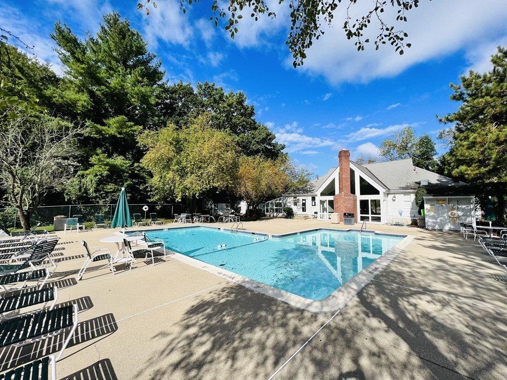 8 Walden Drive, Unit 13 Natick, MA 01760 - Photo 37 of 38 a view of a house with backyard porch and sitting area