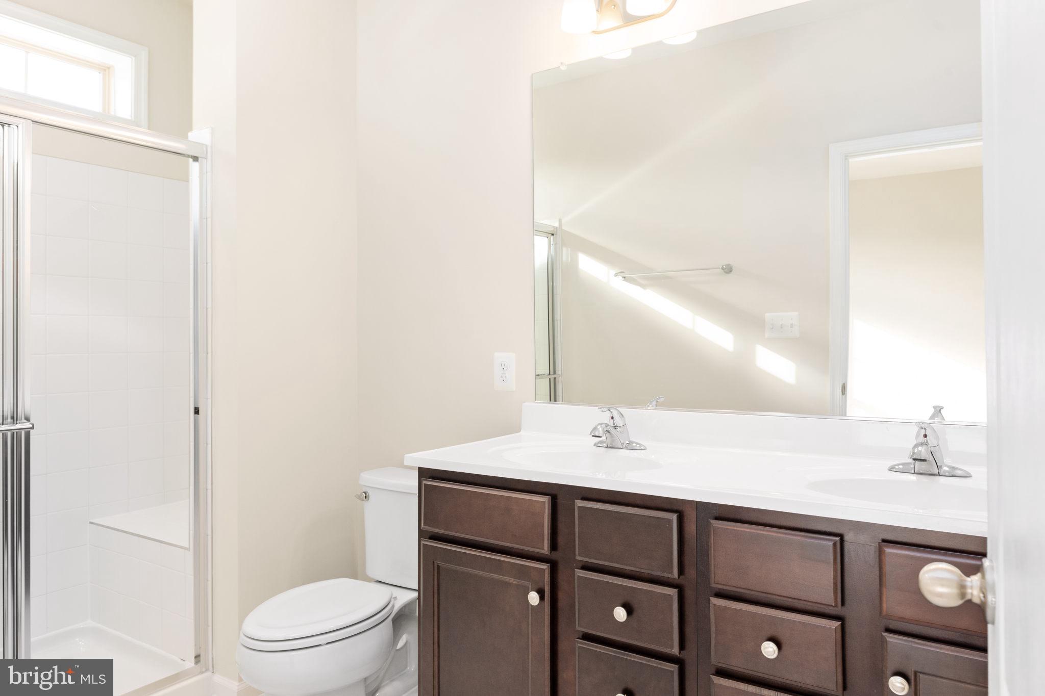 1815 Bird Run Frederick, MD 21702 - Photo 15 of 23 a bathroom with a sink a toilet and shower