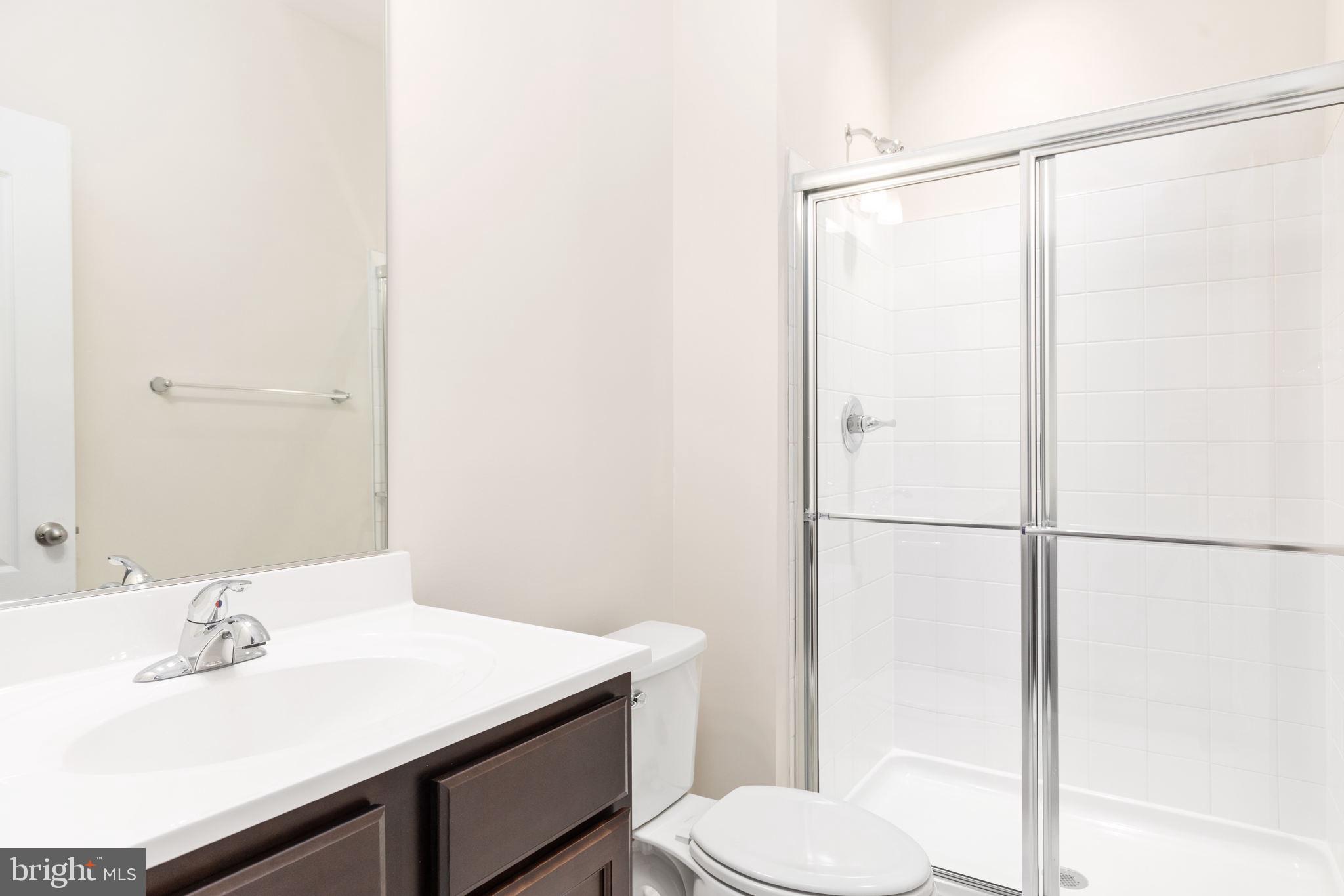1815 Bird Run Frederick, MD 21702 - Photo 22 of 23 a bathroom with a sink toilet and a mirror