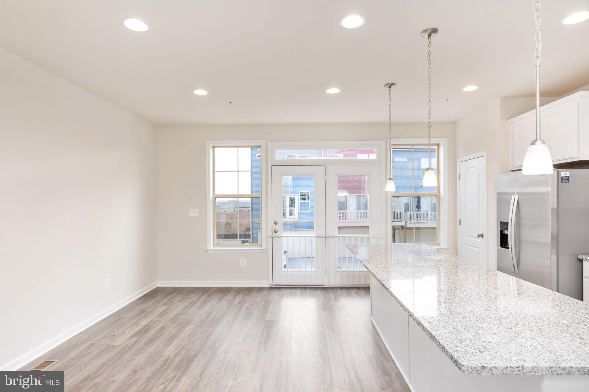 1815 Bird Run Frederick, MD 21702 - Photo 8 of 23 a view of a kitchen with large windows