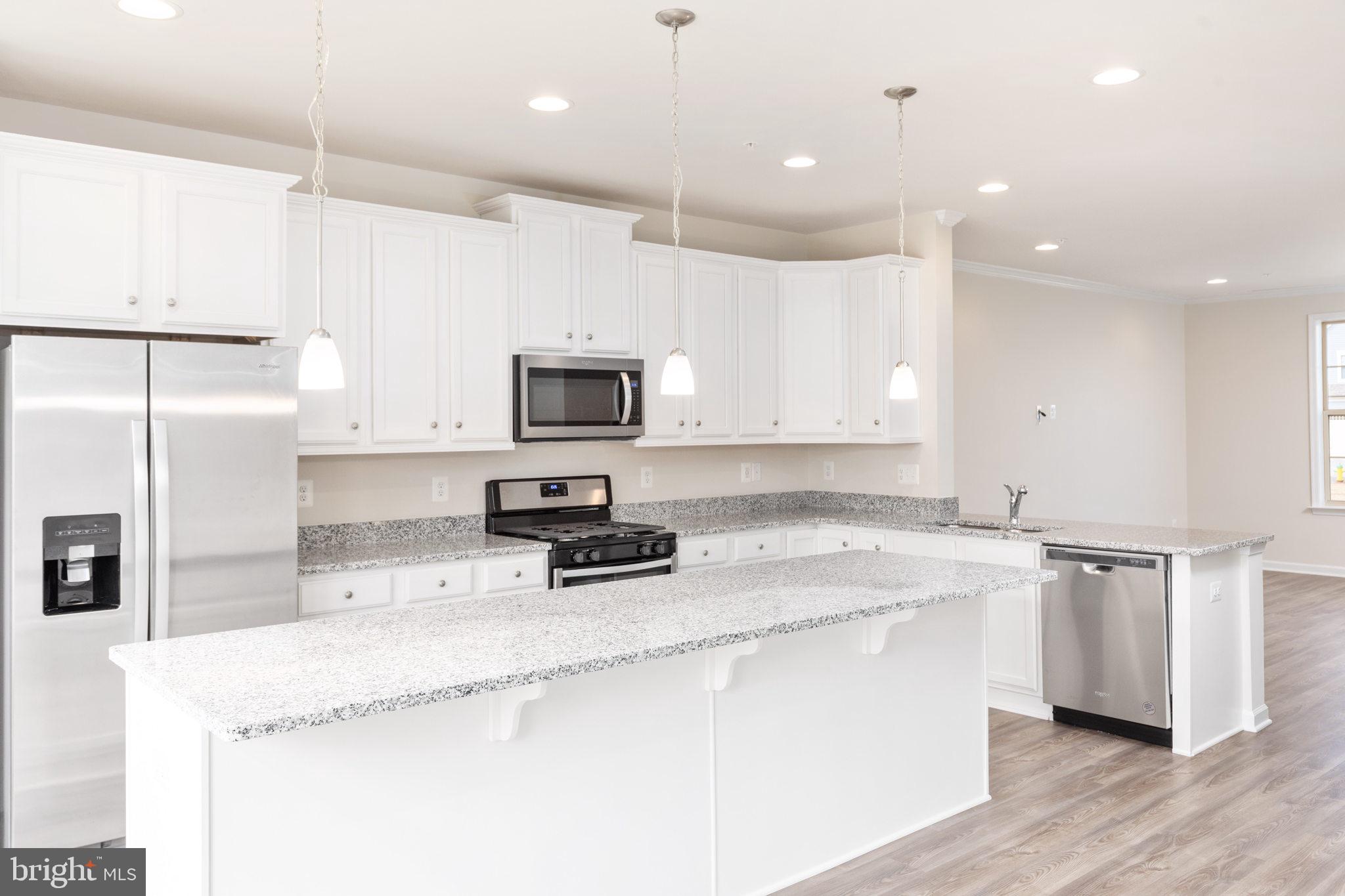 1815 Bird Run Frederick, MD 21702 - Photo 10 of 23 a kitchen with appliances a sink and cabinets