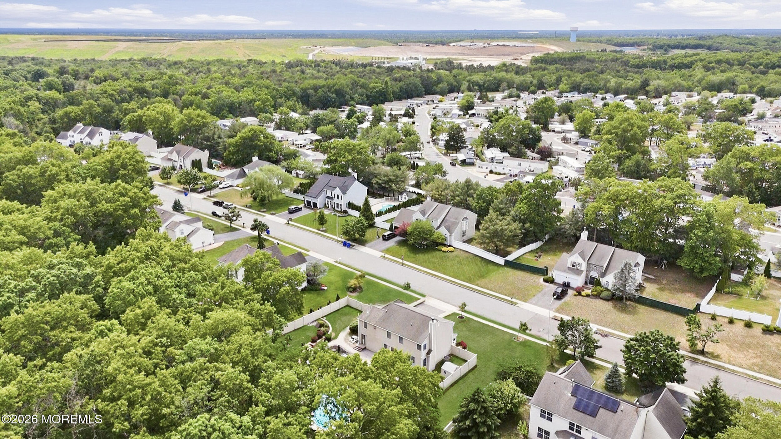 2055 MacKenzie Road Toms River, NJ 08755 - Photo 53 of 56 an aerial view of residential houses with outdoor space and trees