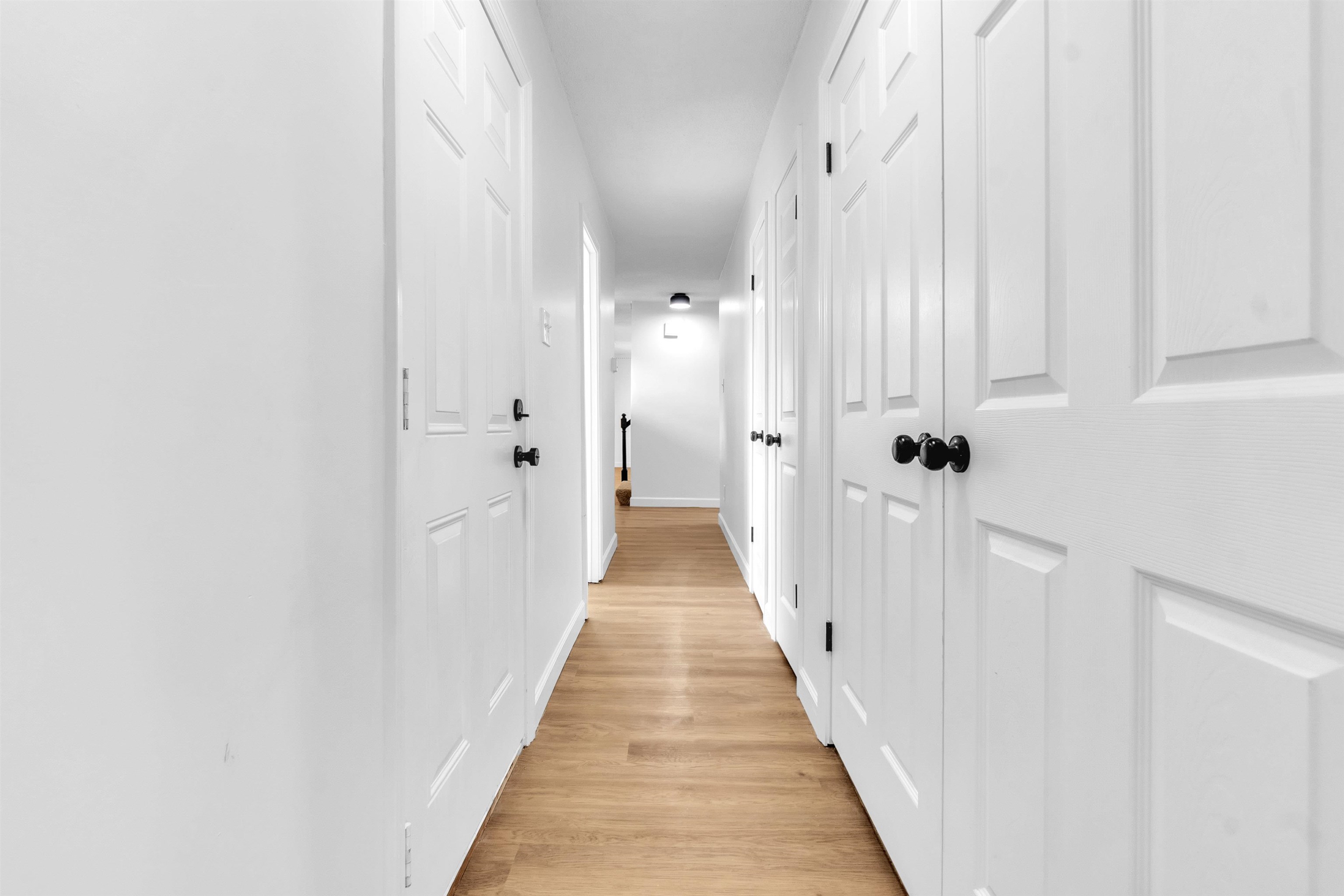 488 West Regis Place Memphis, TN 38018 - Photo 12 of 17 Hall featuring light wood-type flooring and baseboards