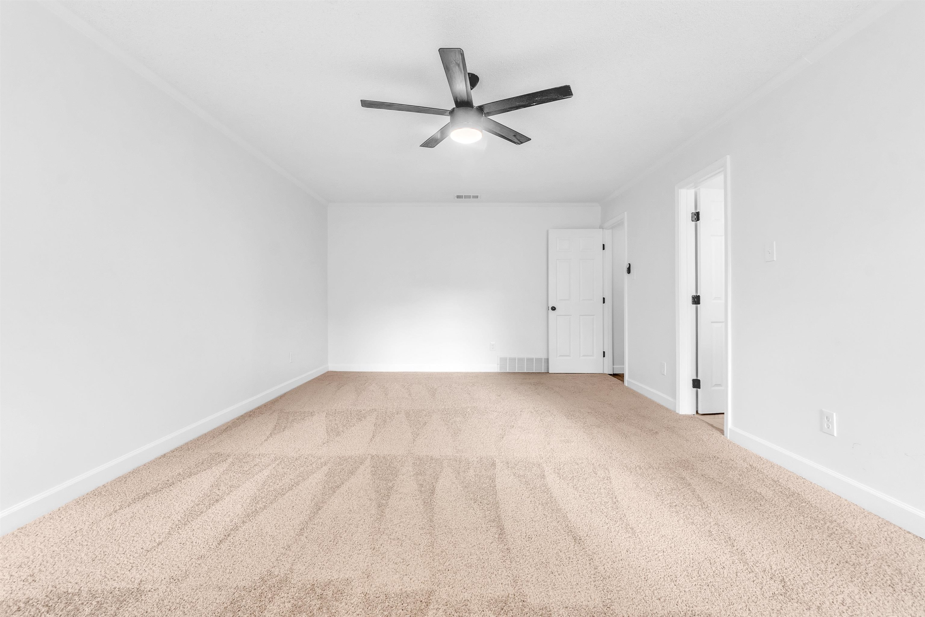 488 West Regis Place Memphis, TN 38018 - Photo 9 of 17 Carpeted empty room with baseboards and a ceiling fan