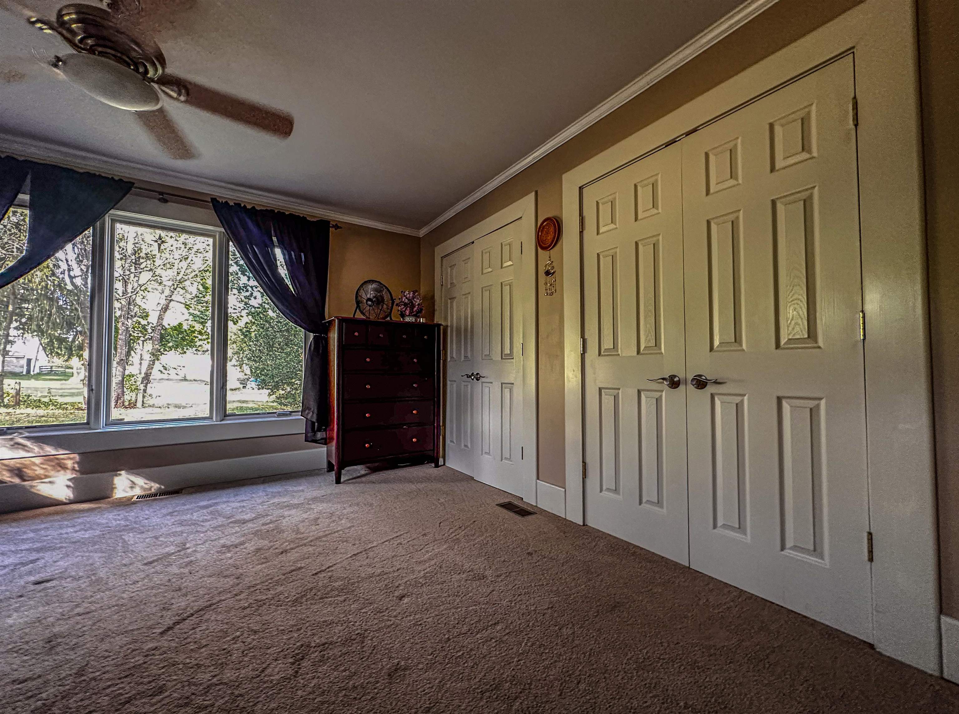 19 Mt Hermon Road Middlebrook, VA 24459 - Photo 56 of 70 a view of empty room with wooden floor and fan