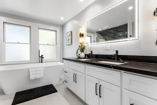 a kitchen with a sink and refrigerator