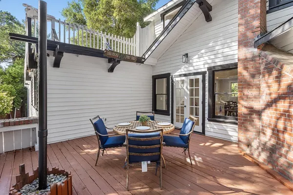 a view of a yard with large trees