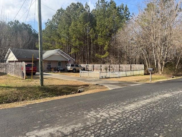 0 West Drive Rome, GA 30165 - Photo 8 of 10 a house with trees in front of it
