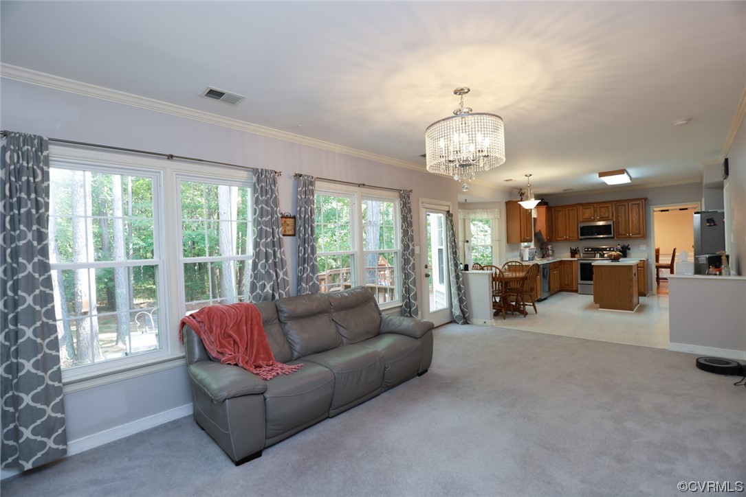 13906 Sagebrook Road Midlothian, VA 23112 - Photo 17 of 50 a living room with furniture and a large window